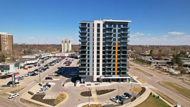 Tuxedo Towers with Winnipeg skyline